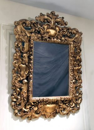 An Impressive Late 19th Century Carved Giltwood Rococo Style Mirror