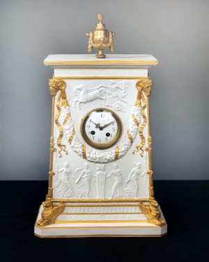 Late 19th Century Gilt Bronze Mounted Parcel-Gilt and Biscuit Porcelain Mantle Clock with Apollo