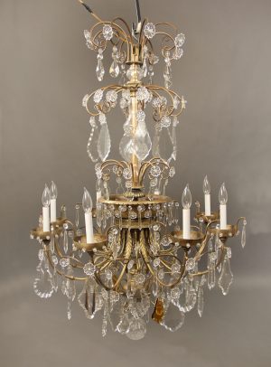 A Lovely Late 19th Century Gilt Bronze and Crystal Eight Light Chandelier