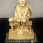 Early 20th Century Gilt Bronze Sculpture of a Child Seated on a Marble Base by Juan Clara