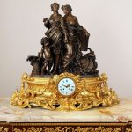 Late 19th Century Gilt and Patinated Bronze Figural Mantle Clock