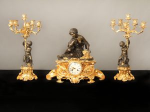 A Fine Mid 19th Century Gilt and Patinated Bronze Three Piece Clock Set By Victor Pierret