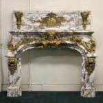 Gilt bronze mounted palatial fireplace surround