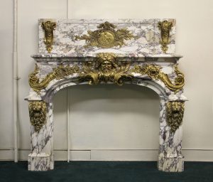 Gilt bronze mounted palatial fireplace surround