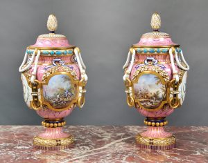 A Pair of Finely Painted Late 19th Century Pink Sèvres Style Porcelain Vases and Covers