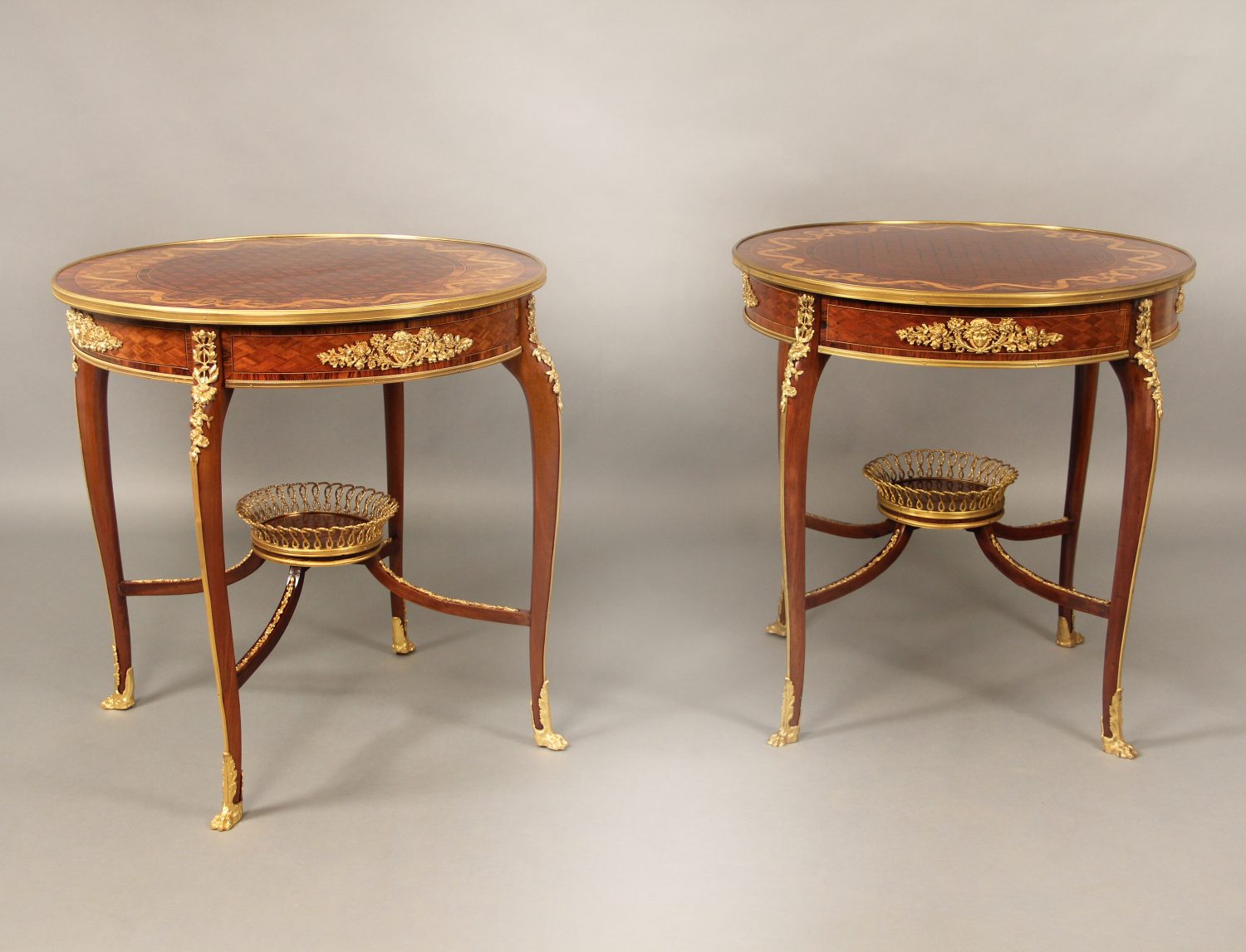 Pair of gilt bronze top lamp tables