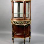 Round tall 19th Century dark wood and glass vitrine