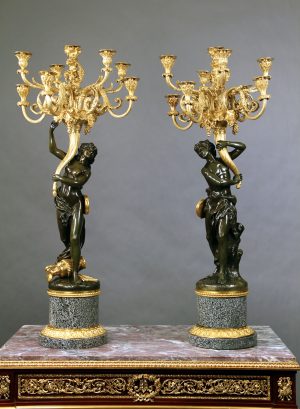 A Very Fine Pair of Late 19th Century Two Tone Bronze Nine Light Candelabra After Clodion