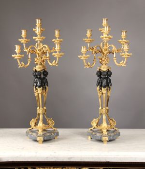An Excellent Pair of Late 19th/Early 20th Century Louis XV Style Parcel-Gilt and Patinated Bronze Seven Light Candelabra