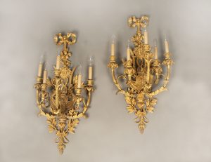 A Large and Elaborate Pair of Early 20th Century Gilt Bronze Five Light Sconces