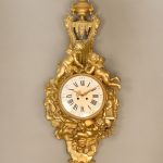 Gold decorative clock by Francois Linke