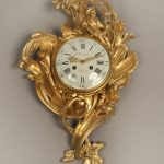 Late 19th Century Louis XV Style Gilt Bronze Cartel Clock with Foliage Designs By Paul Sormani