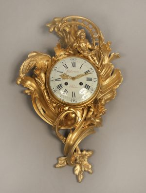 Late 19th Century Louis XV Style Gilt Bronze Cartel Clock with Foliage Designs By Paul Sormani