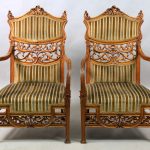 A Beautiful Pair of Early 20th Century Art Nouveau Carved Wood Arm Chairs with High Wavy Arms