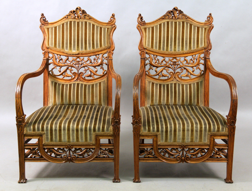 A Beautiful Pair of Early 20th Century Art Nouveau Carved Wood Arm Chairs with High Wavy Arms