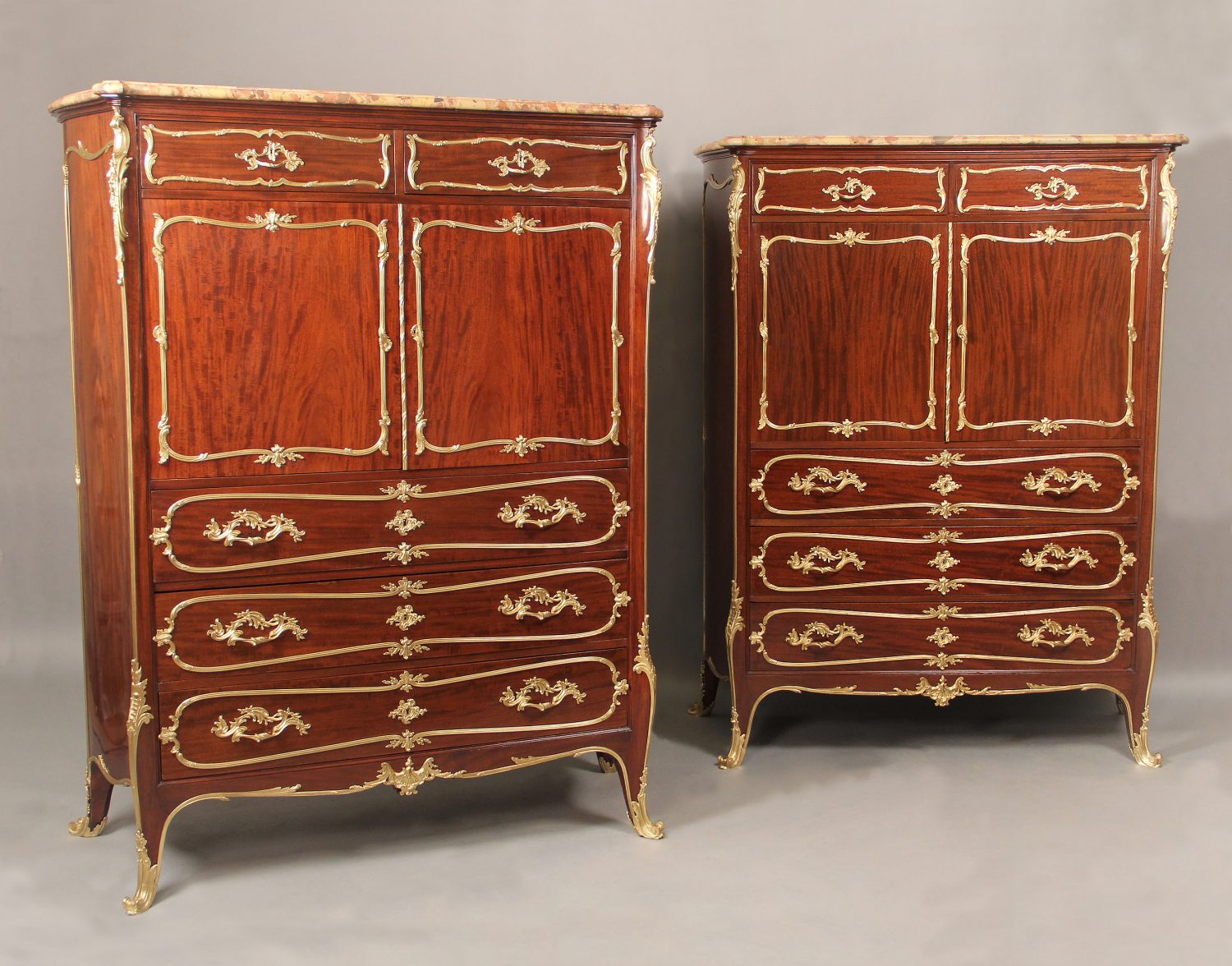 Fine Companion Pair of Early 20th Century Gilt Bronze Mounted Louis XV Style Chest of Drawers by Francois Linke
