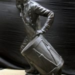 Bronze drummer boy statue