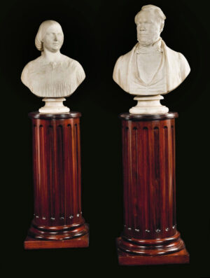 A Fine Pair of Mid 19th Century English Carved Carrara Marble Busts on Wooden Pedestals By John Denton Crittenden