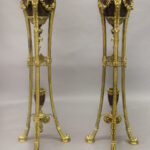 Pair of late 19th century Regence style gilt bronze and rouge griotte marble jardinieres-on-stands.