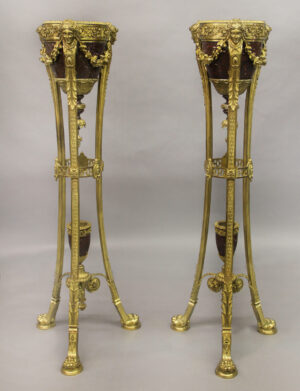 Pair of late 19th century Regence style gilt bronze and rouge griotte marble jardinieres-on-stands.