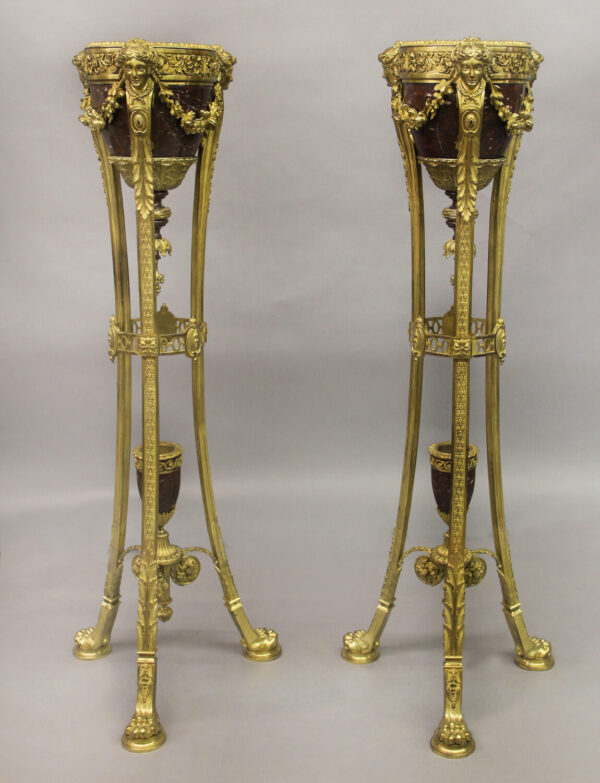 Pair of late 19th century Regence style gilt bronze and rouge griotte marble jardinieres-on-stands.