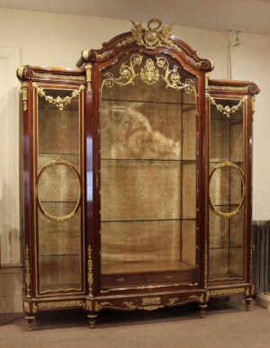 A Palatial and Superb Early 20th Century Gilt Bronze Mounted Louis XVI Style Mahogany Vitrine By François Linke