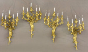 A Very Fine Set of Four Early 20th Century Gilt Bronze Five Light Sconces By Caldwell
