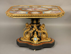 An Excellent Late 19th Century Gilt-Bronze and Sèvres Style Porcelain Mounted Kingwood and Ebonized Wood Center Table
