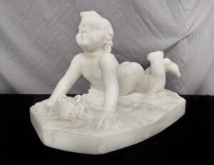 A Cute Late 19th Century Italian White Carrara Marble of a Baby at the Beach by Guglielmo Pugi